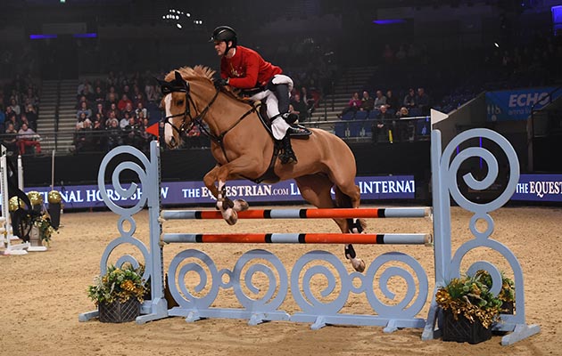 Henry Squibb and Billy Twomey during of Class 13 (Mini Major) at the Equestrian.com Liverpool International Horse Show at Echo Arena, Liverpool, UK; on 1st January December 2016