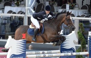 Leonora Smee riding Waltons Top Flight during Grant Road Partners LLC Prix at the Longines Global Champions Tour of London taking place on Horse Guards Parade in central London on 15 August 2014