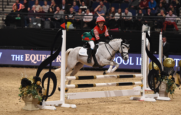 Guy Williams and Luli Loveridge winners of Class 13 (Mini Major) at the Equestrian.com Liverpool International Horse Show at Echo Arena, Liverpool, UK; on 1st January December 2016