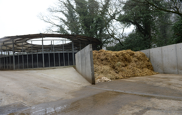 Horse walker and muck heap at Hill Top Farm, the home of Team Wood Show Horse in the village of Birstwith near Harrogate in North Yorkshire in the UK; on 27th January 2017