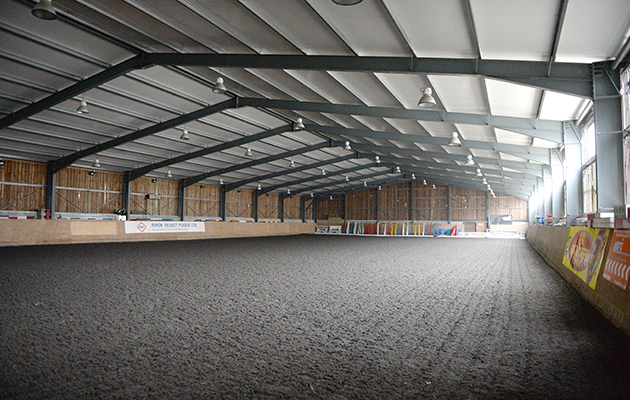 Indoor arena at Hill Top Farm, the home of Team Wood Show Horse in the village of Birstwith near Harrogate in North Yorkshire in the UK; on 27th January 2017