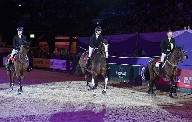 HEATRS DESTINY ridden by Holly Smith, SEBASTIAN VII ridden by Helen Tredwell and CAN YA MAKAN ridden by Shane Breen in the Grandstand Media Five Fence Challenge during the Horse of the Year Show at the NEC near Birmingham, UK between 4th - 8th October 2017