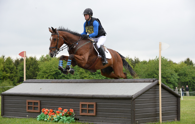 Tom Searle riding GARRANLEA VIVENDI during the Rockingham Castle Horse Trials in The Great Park of Rockingham Castle, Rockingham near corby Northamptonshire, UK on 24th May 2015