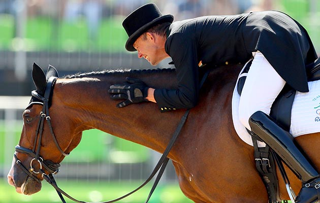Mandatory Credit: Photo by James Crombie/INPHO/REX/Shutterstock (5823036h) Ireland's Jonty Evans celebrates with Cooley Rorkes Drift, Eventing Team Dressage Rio 2016 Olympic Games Day 2, Rio de Janeiro, Brazil, Eventing Team Dressage Day 2 - 07 Aug 2016