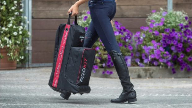 Equestrian carrying a LeMieux boot bag