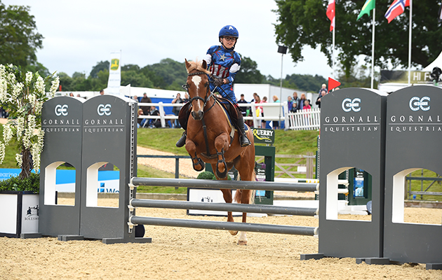 Will Edwards and Ted Holt during the invitational Mini Major Relay during the Equerry Bolesworth International Horse Show  at Bolesworth Castle near Chester in Cheshire in the UK on 17th June 2018