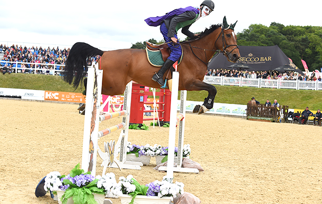 Will Edwards and Ted Holt during the invitational Mini Major Relay during the Equerry Bolesworth International Horse Show  at Bolesworth Castle near Chester in Cheshire in the UK on 17th June 2018