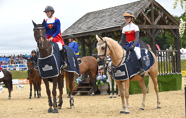 Laura Renwick and Scarlett Lomax-Cox, winners of the invitational Mini Major Relay during the Equerry Bolesworth International Horse Show  at Bolesworth Castle near Chester in Cheshire in the UK on 17th June 2018