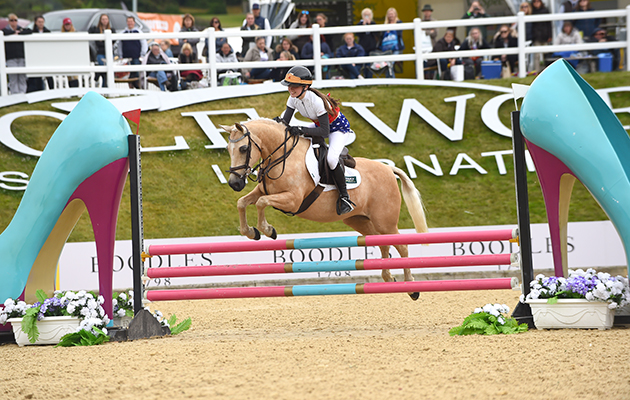 Laura Renwick and Scarlett Lomax-Cox, winners of the invitational Mini Major Relay during the Equerry Bolesworth International Horse Show  at Bolesworth Castle near Chester in Cheshire in the UK on 17th June 2018