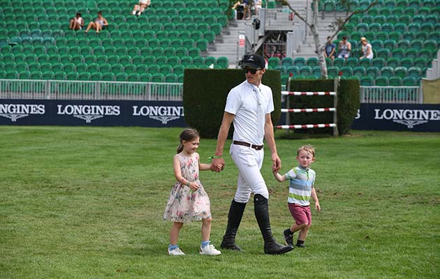William Whitaker walking the course of The Bunn Leisure Trophy with some help from Oliver and Isabella Whitaker, to ensure he has the right stride, during The Longines FEI Jumping Nations Cup™ of Great Britain at the BHS Royal International Horse Show held at the Hickstead Show ground near Haywards Heath in West Sussex, in the UK between 25-29th July 2018