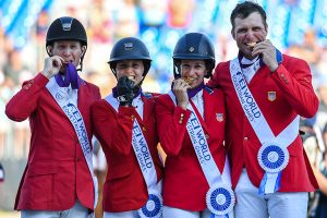 Laura Kraut winning team gold at WEG in 2018