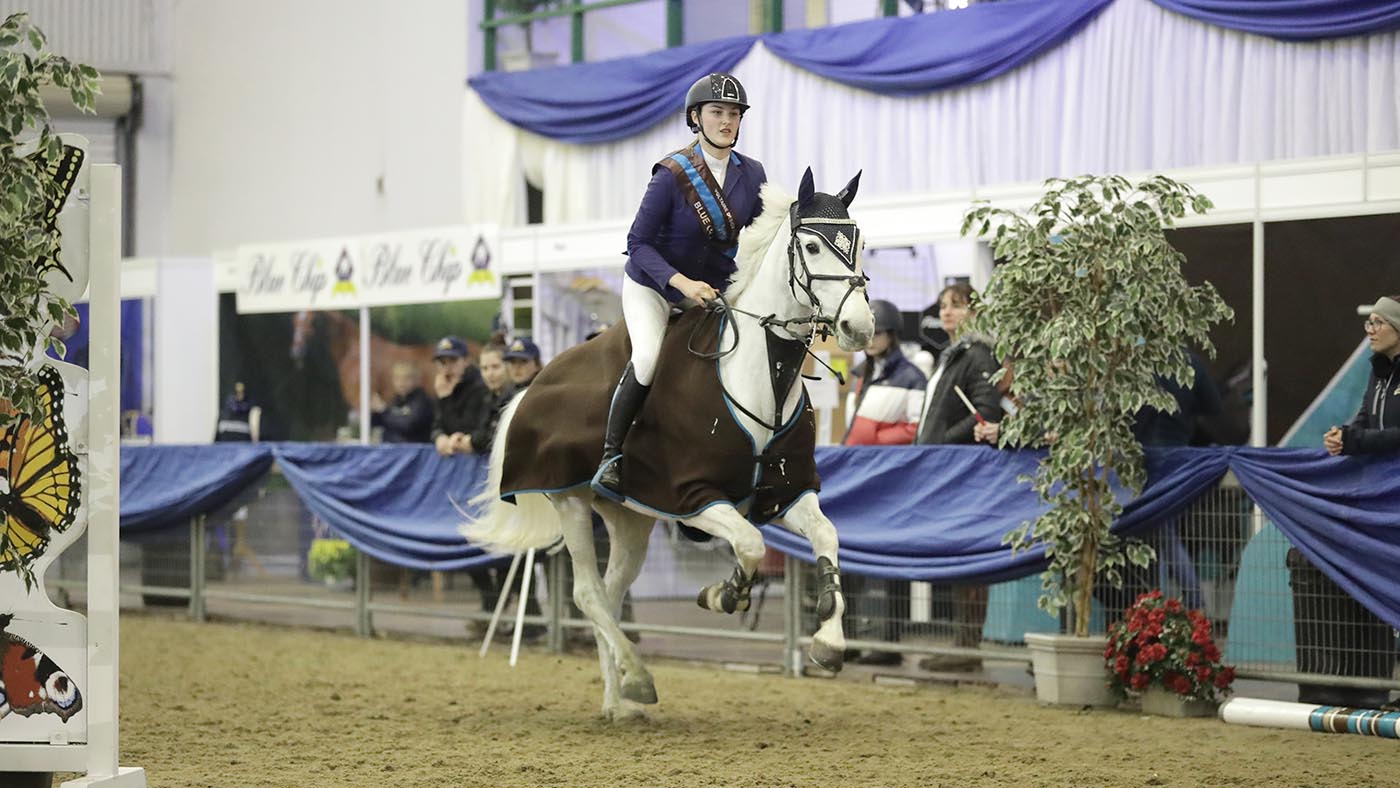 Blue Chip Winter Championships 2019 41 - Voltaire Design Pony Coral Championship  1 10m0039 - Coolatooder Liath and Eloise Burden