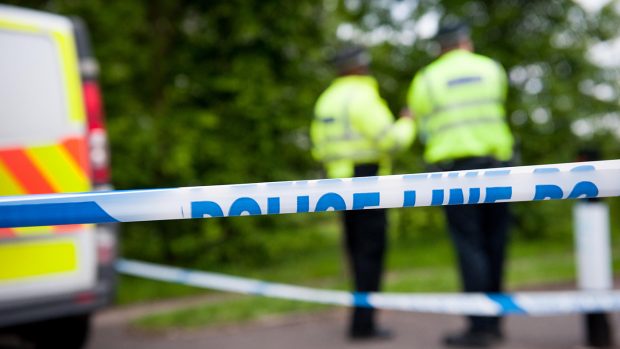 Sam Thomas Helicopter crash ER2FRW Police Line Do Not Cross tape to mark cordon for press and public at murder scene