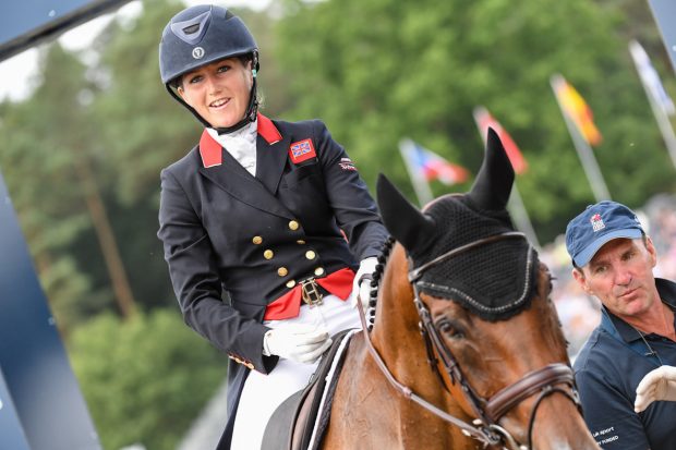 Laura Collett and London 52 at the 2019 European Championships Laura Collett and London 52 leaving the arena after their dressage test at the European Eventing Championships 2019, with British performance manager Dickie Waygood alongside.
