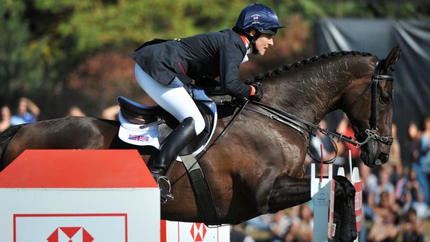 British Kristina Cook jumps with Miners Frolic on September 27, 2009 in Fontainebleau, east of Paris, before winning the European Equestrian jumping championship. AFP PHOTO MIGUEL MEDINA (Photo credit should read MIGUEL MEDINA/AFP/Getty Images)