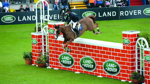 Christopher MEGAHEY (IRL) riding Seapatrick Cruise Cavalier, joint winner of Land Rover Puissance (International Comp 10) during Dublin Horse Show, in the Royal Dublin Society showground in Dublin in Ireland between 9 - 13th August 2017
