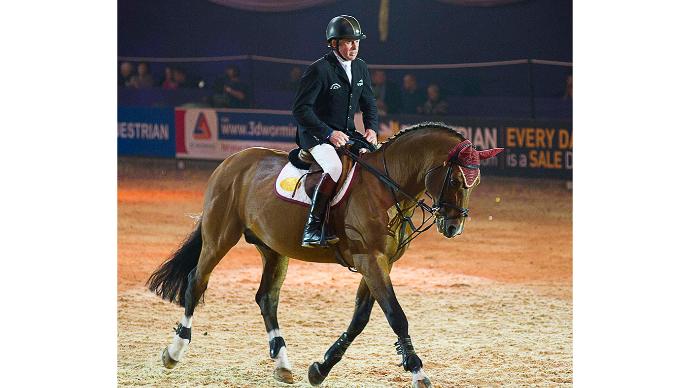 DG4YYC Birmingham, UK. 13th Oct, 2013. Arko Ridden by Nick Skelton in the Grand Finale. (HOYS). National Exhibition Centre (NEC). Birmingham. UK. 13/10/2013. Credit: Sport In Pictures/Alamy Live News