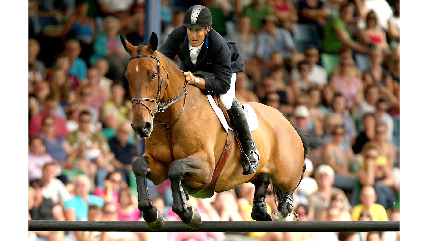 HICKSTEAD, UNITED KINGDOM - JUNE 28: William Funnell riding Mondriaan jumps clear on their way to winning The DFS Derby during The British Jumping Derby Meeting at Hickstead, The All England Jumping Course on June 28, 2009 in Hickstead, United Kingdom. (Photo by Richard Heathcote/Getty Images)