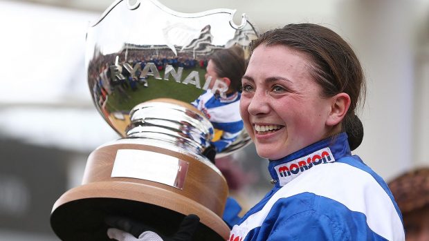 Bryony Frost CHELTENHAM, ENGLAND - MARCH 14: Jockey Bryony Frost poses with the trophy after she rides Frodon to victory during the Ryanair Chase during St Patrick's Thursday at Cheltenham Racecourse on March 14, 2019 in Cheltenham, England. (Photo by Michael Steele/Getty Images)