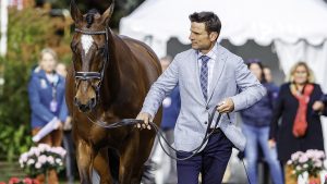 Australian Olympic eventer Shane Rose, picture trotting up Virgil at Pau five-star, wore a mankini for a fancy dress jumping competition.