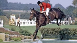 Graham Fletcher of Great Britain riding Tauna Dora over a jump during the Wills Castella Stakes at Hickstead on 16th August 1973. (Photo by Ed Lacey/Popperfoto/Getty Images)