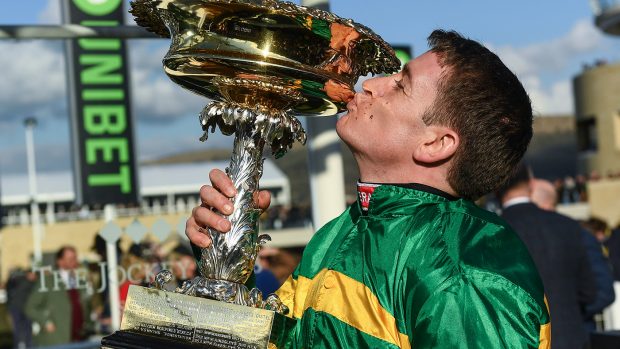 Cheltenham , United Kingdom – 13 March 2018; Jockey Barry Geraghty after winning the UniBet Champion Hurdle Challenge Trophy with Buveur D’air on Day One of the Cheltenham Racing Festival at Prestbury Park in Cheltenham, England. (Photo By Ramsey Cardy/Sportsfile via Getty Images)