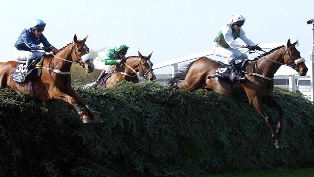 Grand National resutls Montys Pass and Barry Geraghty (right) jump their way to victory in the Grand National at Aintree Races, Liverpool.