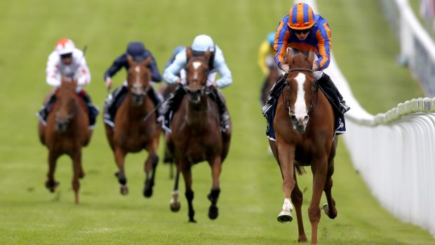 Royal Ascot betting day two Prince Of Wales’s Stakes Love ridden by jockey Ryan Moore (right) wins the Investec Oaks at Epsom Racecourse.