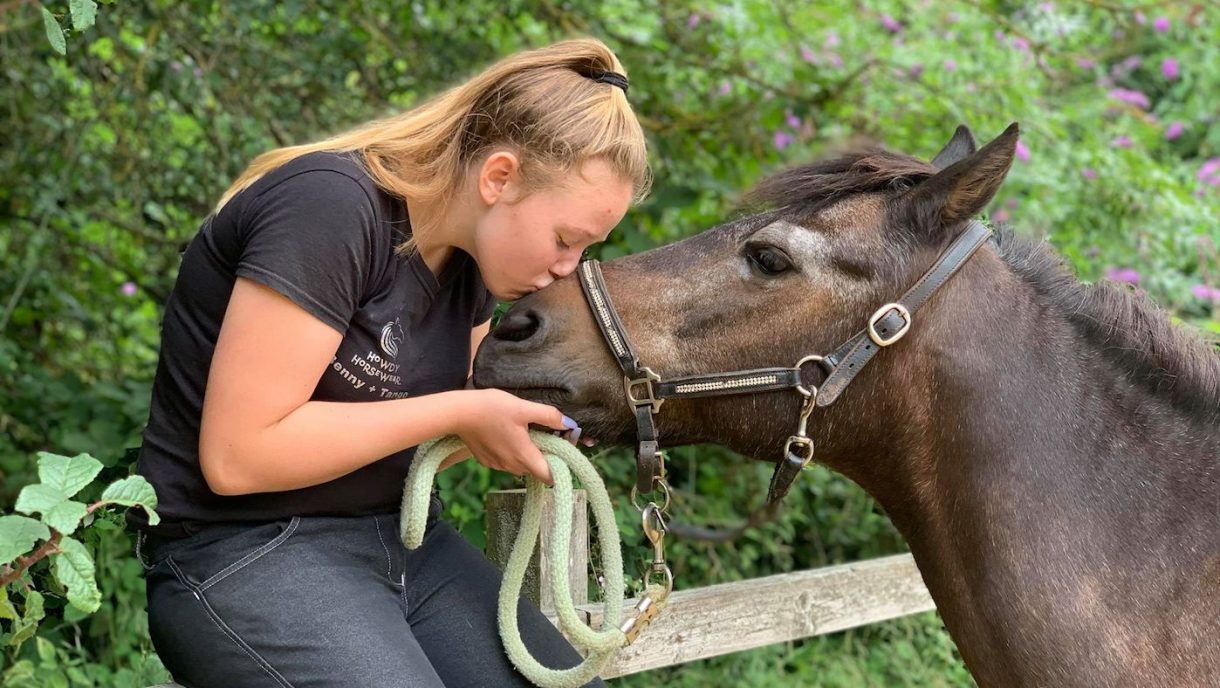 Grazing muzzle cut off laminitic pony after his first night out in the