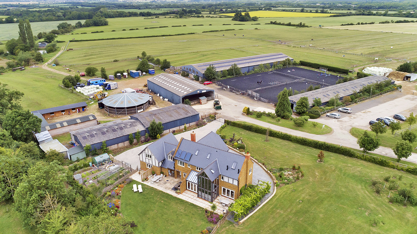 How about living here? Complete with 64 stables, a solarium, indoor and ...