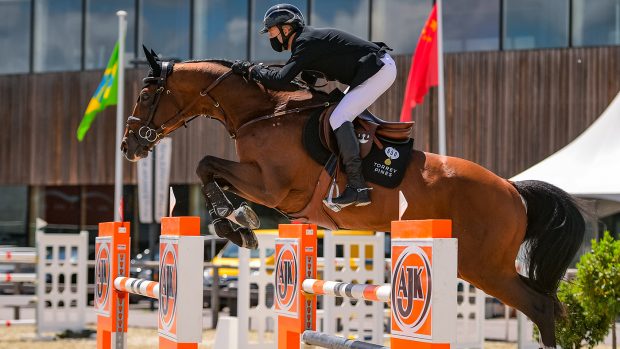 Eric Lamaze jumping at Lier in a mask