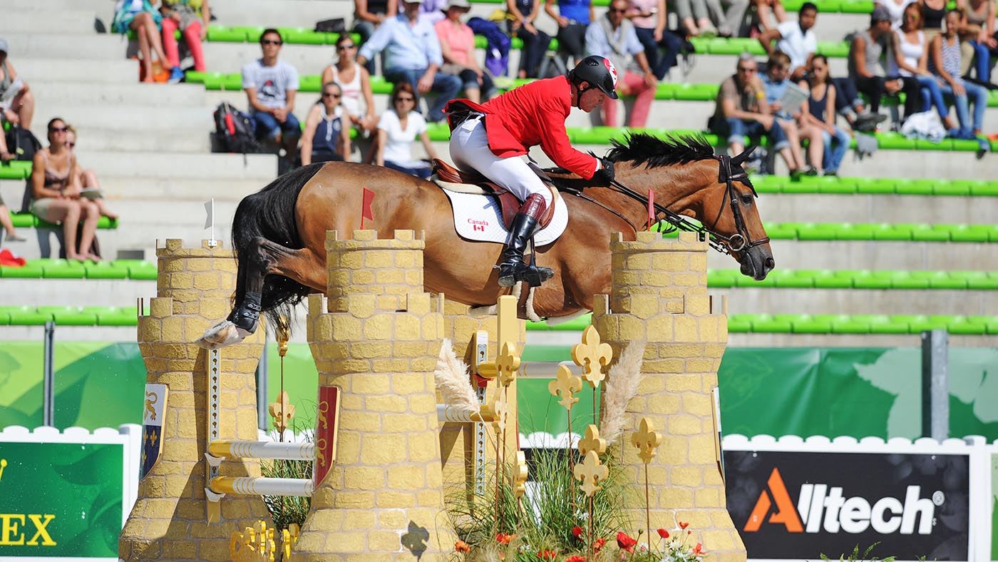 Ian MILLAR riding Dixson CAN during the First Round of the Team Competition at WEG in Stadium D'Ornano Caen, Normandy in France between 23 August to 7 September 2014