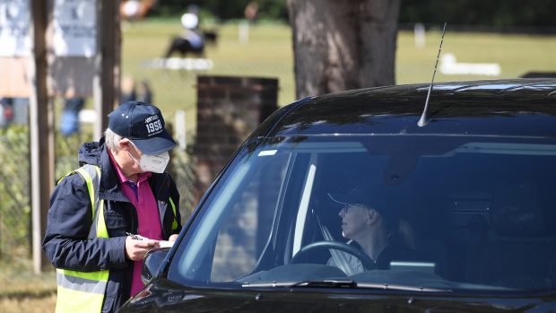 An equestrian volunteer at Tweseldown