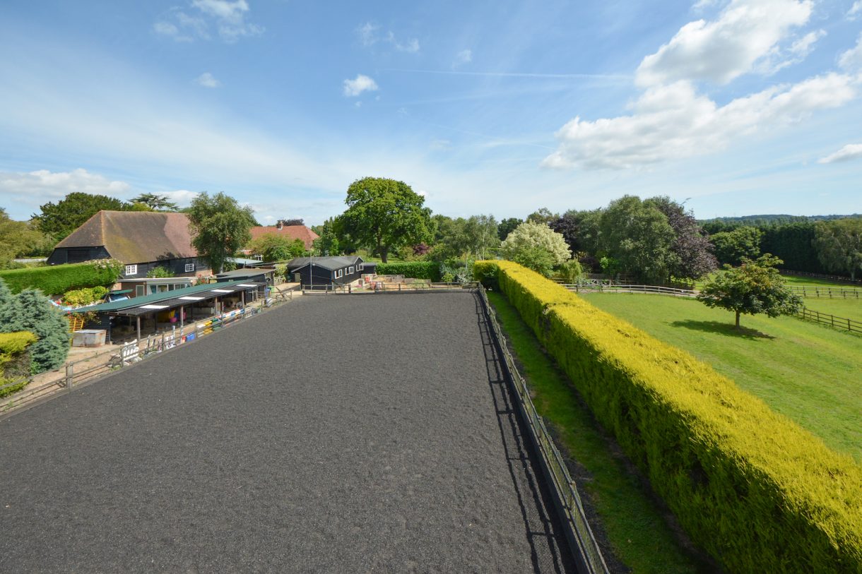 Spend the colder months in this cosy house, complete with stables