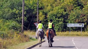 Can you ride double file on the road