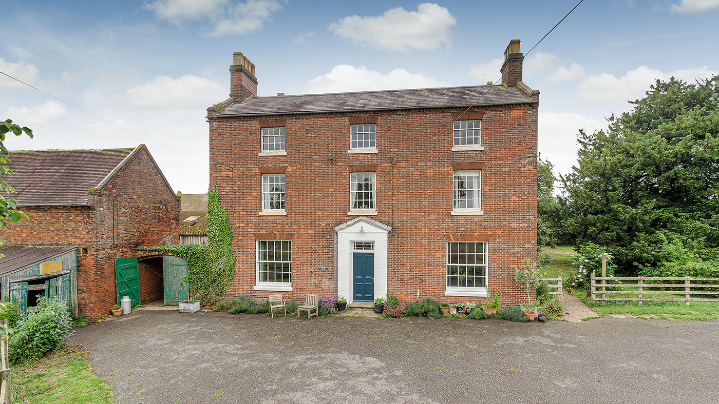 Daydream over what you could do with this farmhouse in almost