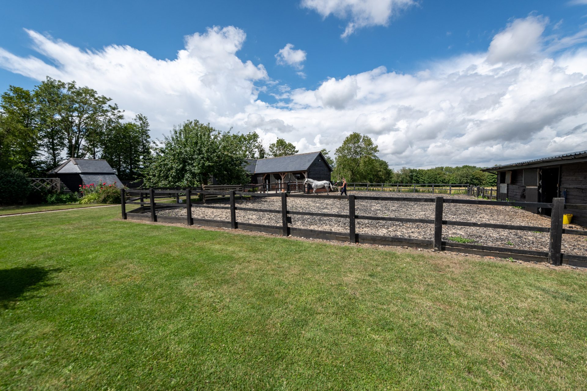 A splendid home in a rural area complete with 5 stables, arena and ...