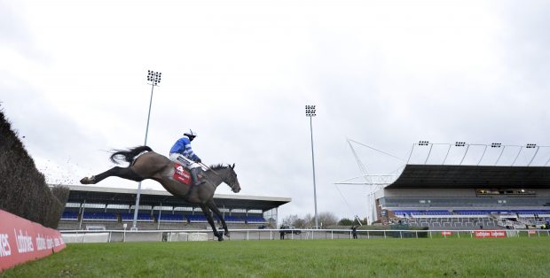 Frodon Bryony Frost King George 2020 Frodon and Bryony Frost jump the last in front to win in front of empty stands 26-12-20