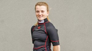 BATH, ENGLAND - AUGUST 06: Hollie Doyle poses in her branded clothing at Bath Racecourse on August 06, 2020 in Bath, England. Owners are allowed to attend if they have a runner at the meeting otherwise racing remains behind closed doors to the public due to the Coronavirus pandemic. (Photo by Alan Crowhurst/Getty Images)
