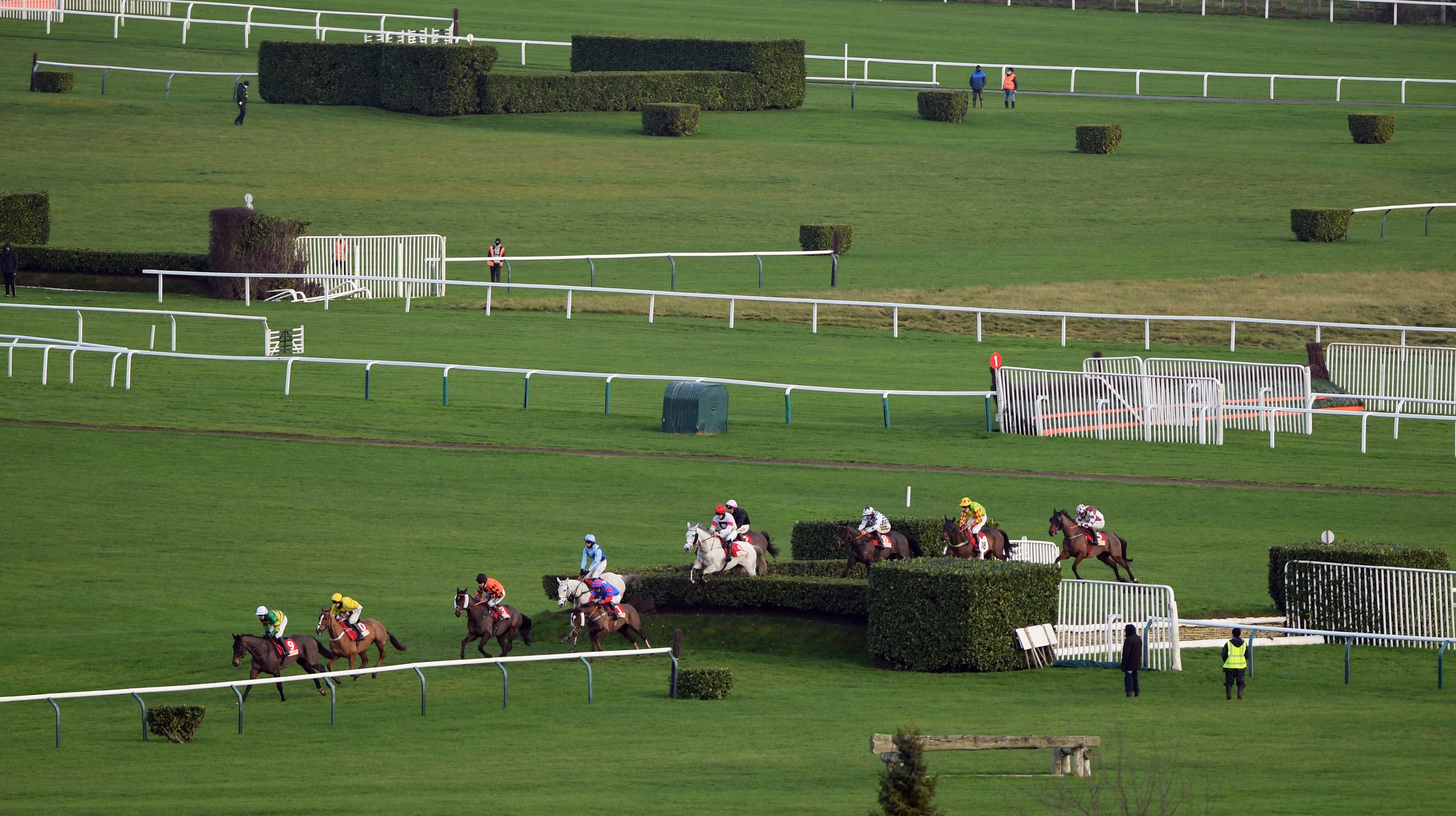 Some Neck, (the grey, jockey with red cap) crosses the bank on way to winning 11-12-20