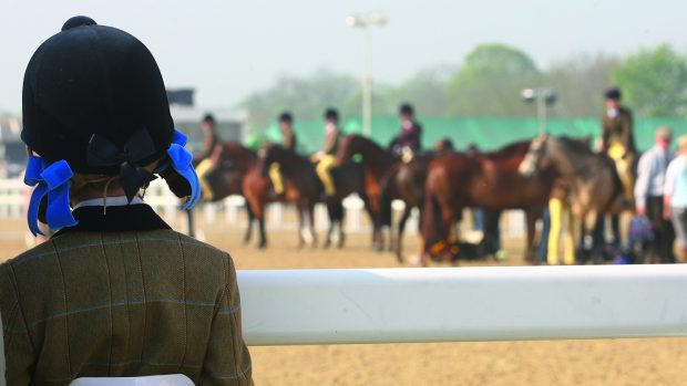 Young competitor watches a showing class