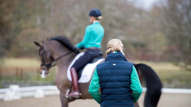 LAURA TOMLINSON LOOKS ON WITH Lara Griffith - Eastington Stables, Ampney St Peter, Gloucestershire, United Kingdom - 21 December 2016