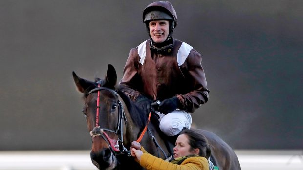 Domaine De L’isle ridden by David Bass (right) after his victory in The BET365 Handicap Steeple Chase at Ascot Racecourse.