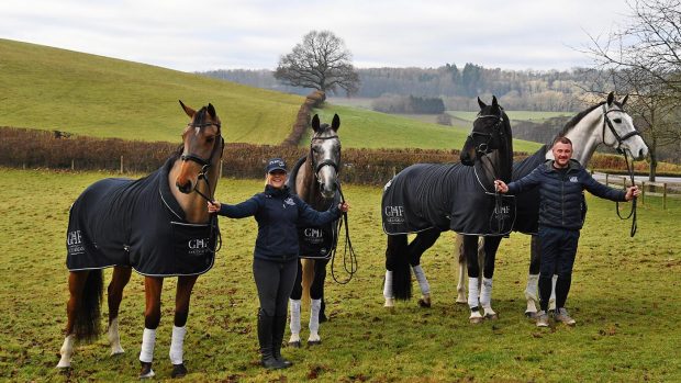 Vicky Tuffs with Kogola (Bay mare) and CFH Daker Hill (Grey) and Andrew Williams with Kojak (Black gelding) and Linking Park K (Grey gelding) at GHF Equestrian yard at Great House Farm near Usk in Monmouthshire in Wales on the 10th January 2021