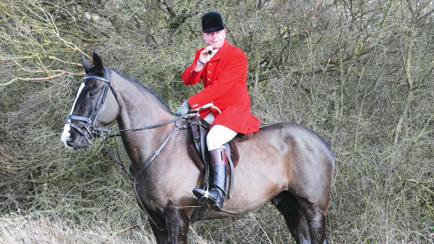 Bill Bishop (Huntsman&Master) of the Oakley during the Hunts meet at Church Farm, Clifton Reynes in Buckinghamshire on 25th February 2014