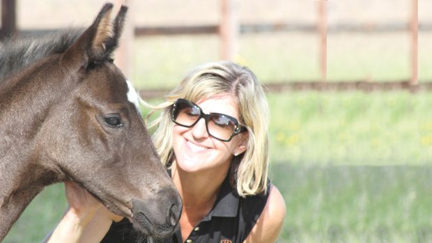 Sara Longworth with a Waverley Stud foal.