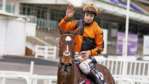 Jockey Aidan Coleman riding Put The Kettle On celebrates after winning The Queen Mother Champion Chase at Cheltenham Racecourse on March 17, 2021 in Cheltenham. (Photo by Alan Crowhurst / POOL / AFP) (Photo by ALAN CROWHURST/POOL/AFP via Getty Images)