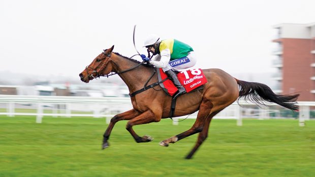 NEWBURY, ENGLAND - NOVEMBER 28: Tom Scudamore riding Cloth Cap clear the last to win The Ladbrokes Trophy Chase at Newbury Racecourse on November 28, 2020 in Newbury, England. Owners are allowed to attend if they have a runner at the meeting otherwise racing remains behind closed doors to the public due to the Coronavirus pandemic. (Photo by Alan Crowhurst/Getty Images)