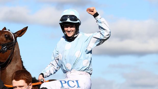 CHELTENHAM, ENGLAND - MARCH 16: Rachael Blackmore onboard Honeysuckle celebrates after victory in the Unibet Champion Hurdle Challenge Trophy (Grade 1) on Day One of the Cheltenham Festival at Cheltenham Racecourse on March 16, 2021 in Cheltenham, England. Sporting venues around the UK remain under strict restrictions due to the Coronavirus Pandemic as Government social distancing laws prohibit spectators inside venues resulting in events being held behind closed doors. (Photo by Michael Steele/Getty Images)