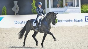 Lottie Fry riding Glamourdale at Aachen.